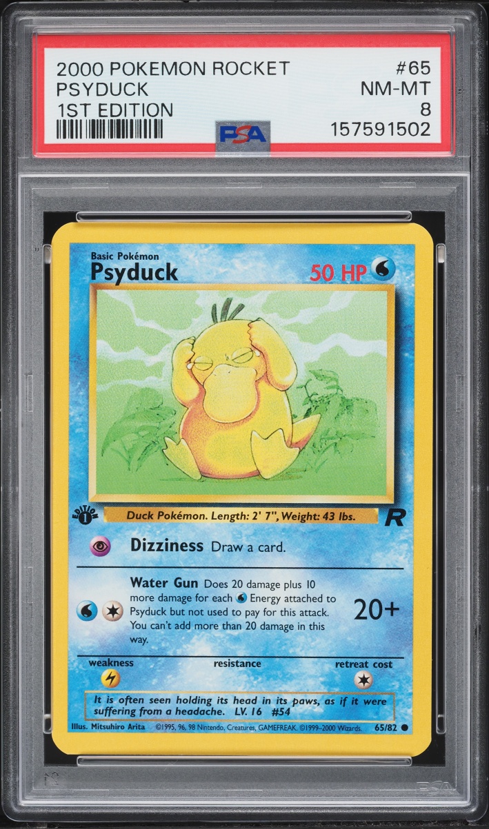2000 Pokemon Team Rocket 1st Edition Psyduck #65 PSA 8 NM-MT