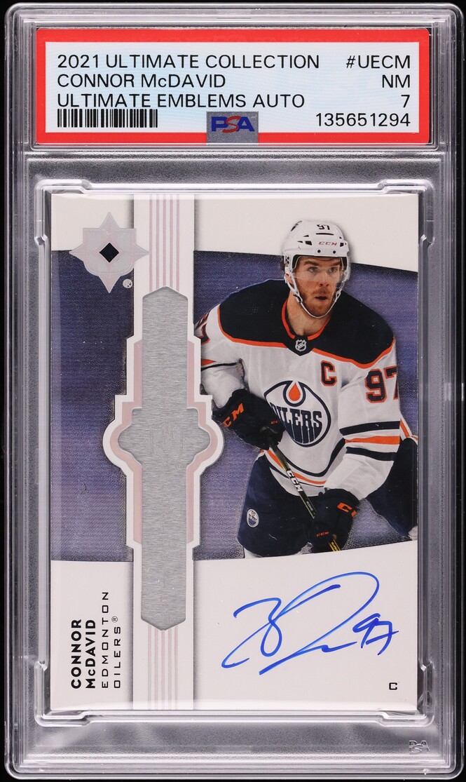 2021 Ultimate Collection Ultimate Emblems Connor McDavid AUTO #UE-CM PSA 7 NRMT - Photo 1