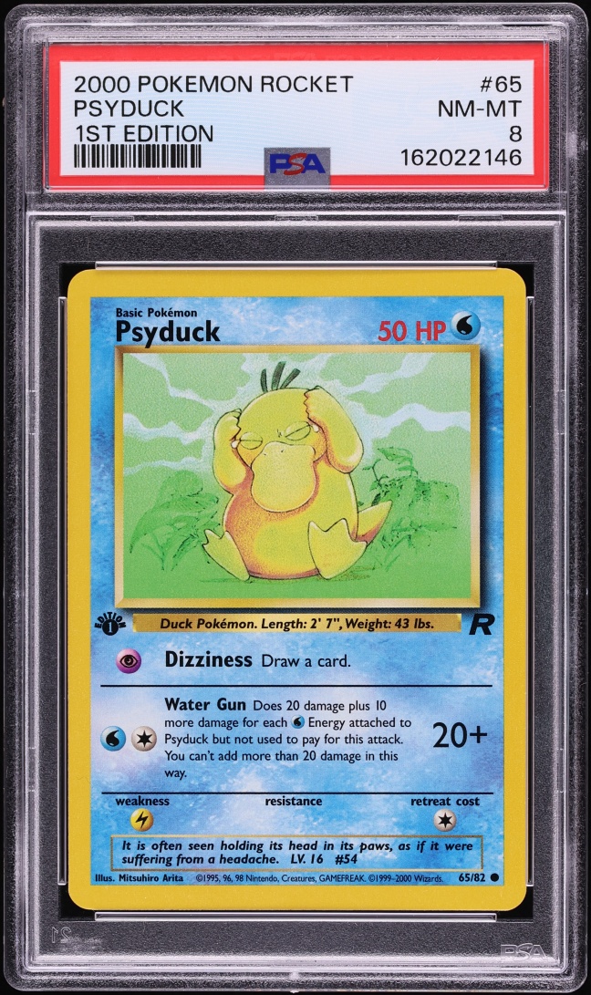 2000 Pokemon Team Rocket 1st Edition Psyduck #65 PSA 8 NM-MT