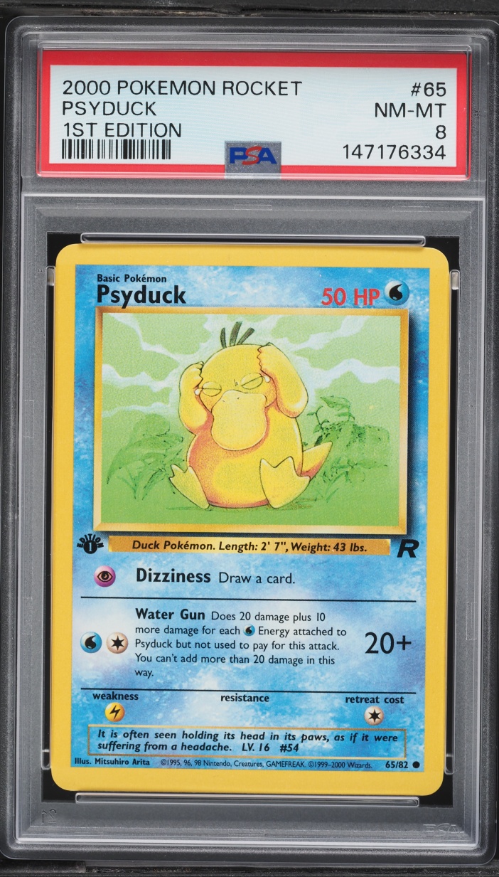 2000 Pokemon Team Rocket 1st Edition Psyduck #65 PSA 8 NM-MT