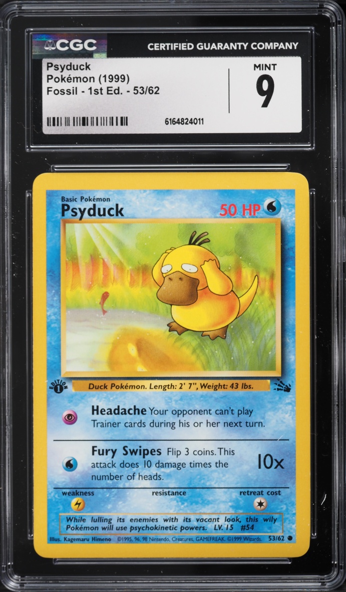 1999 Pokemon Fossil 1st Edition Psyduck #53 CGC 9 MINT