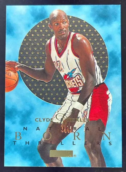 1995-96 Skybox E-XL Natural Born Thrillers #4 Clyde Drexler